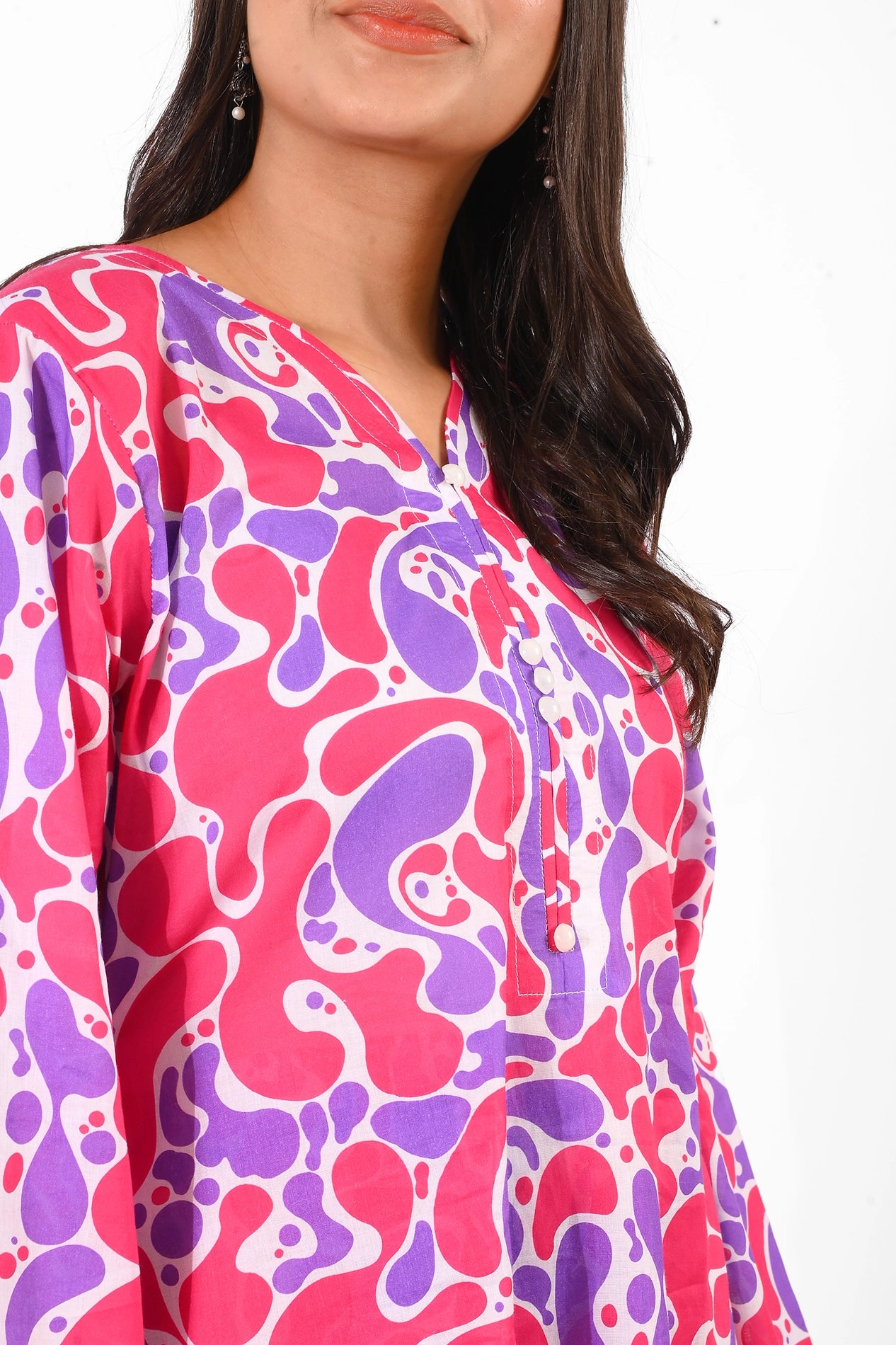 Close-up of the neckline and sleeve details of a pink and purple abstract-print kurti BOLDSTEP BOLDSTEP.PK
