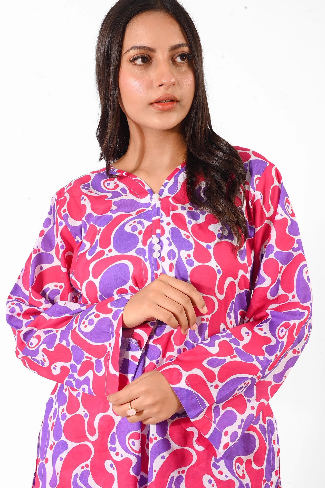 Portrait-style view of a model showcasing the bright, colorful details of the kurti BOLDSTEP BOLDSTEP.PK