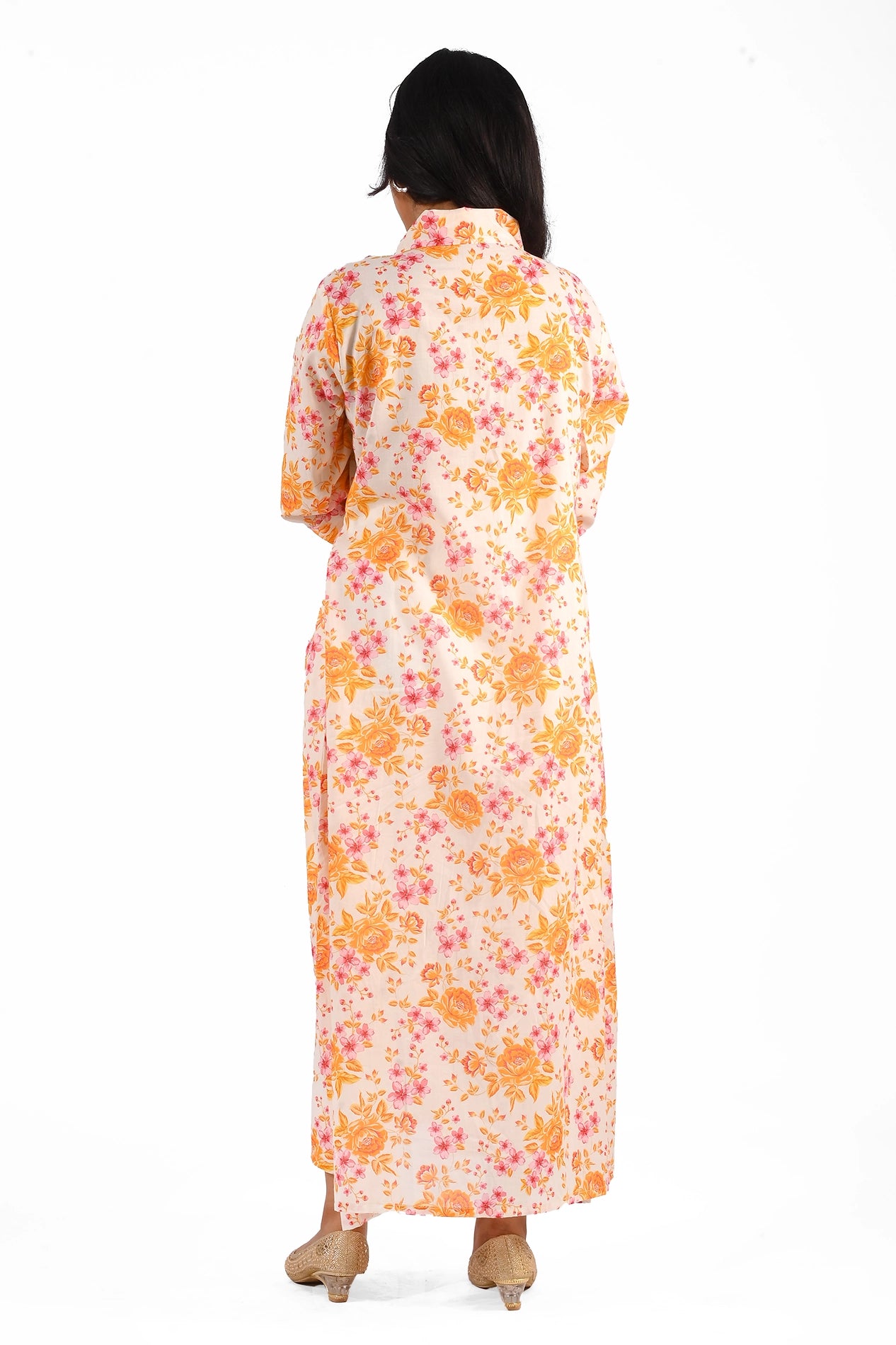 Back view of the floral dress, highlighting its flowing structure and pattern consistency. BOLDSTEP BOLDSTEP.PK