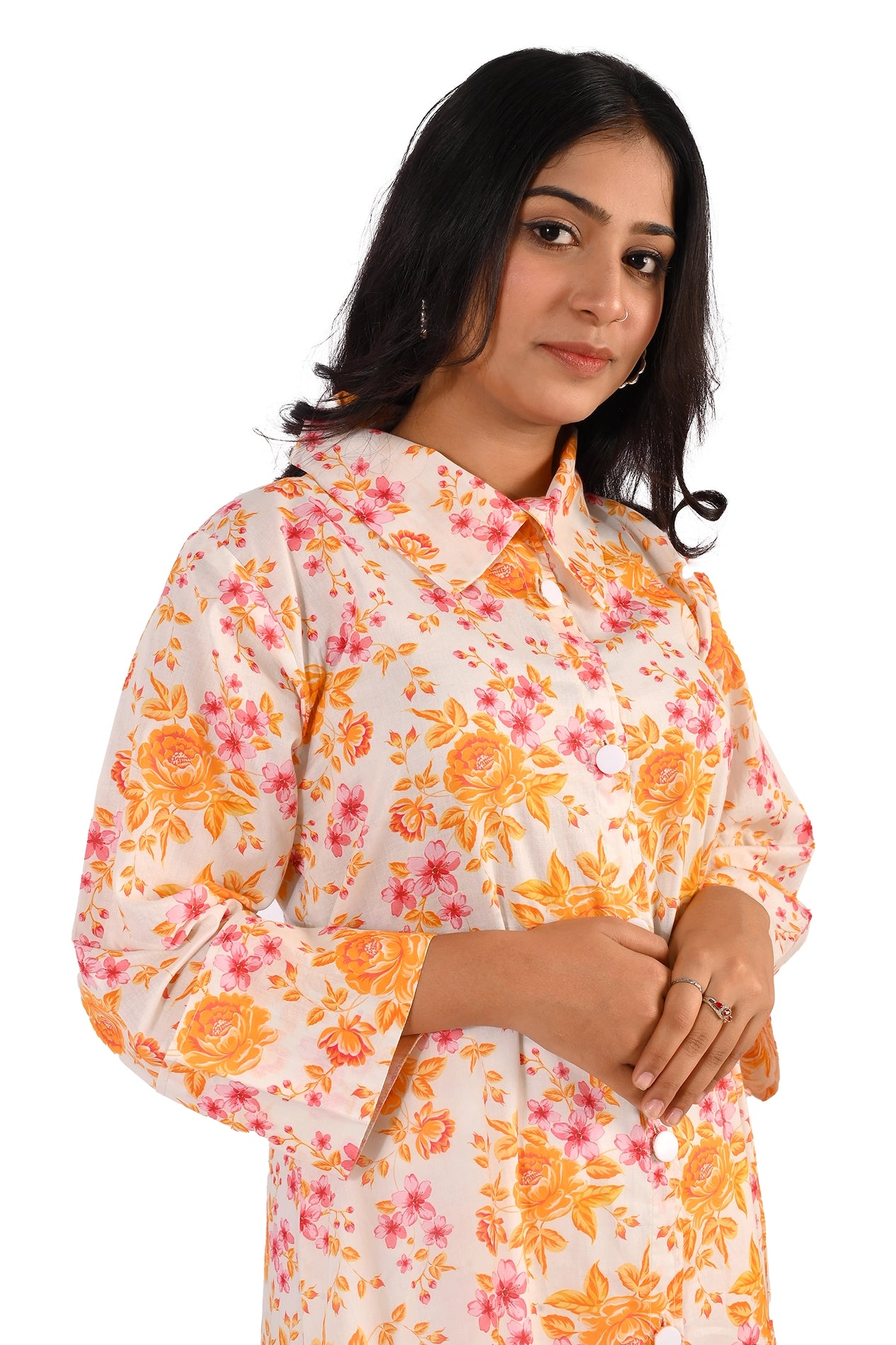 Close-up of the model wearing the floral dress, focusing on the collared neckline and intricate floral print. BOLDSTEP BOLDSTEP.PK