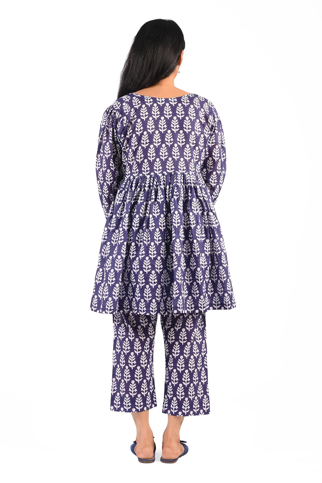 A full-length view of the outfit from behind, showcasing the evenly printed white leaf patterns on the navy blue fabric. The loose-fitting dress provides a modest and elegant style BOLDSTEP BOLDSTEP.PK