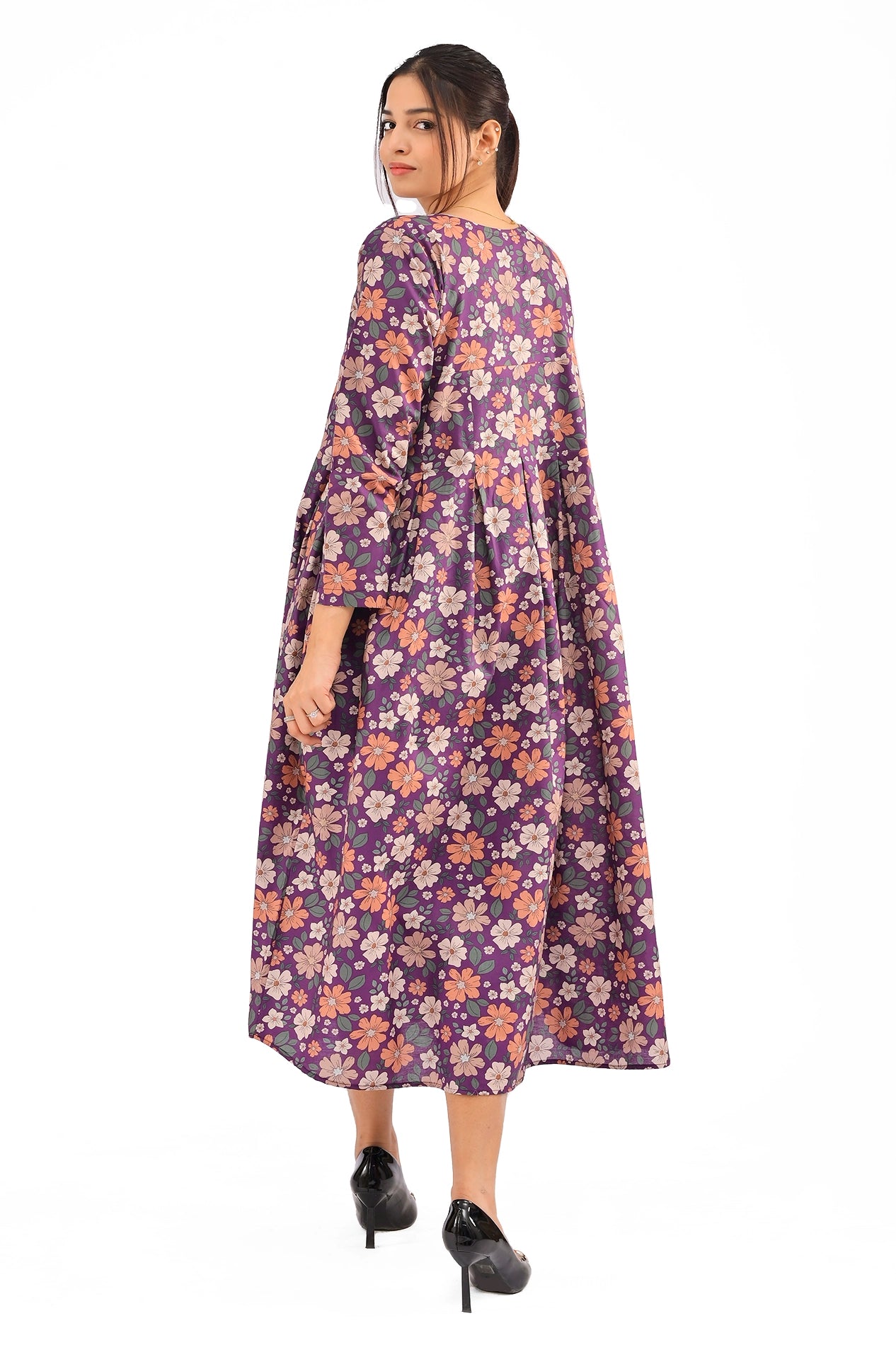 Back view of the purple floral maxi dress, displaying its flowy structure and full-length design for a chic look. BOLDSTEP BOLDSTEP.PK