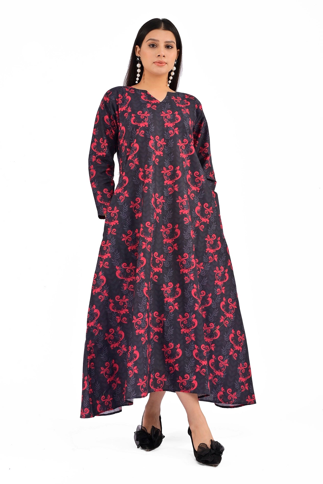 Front view of a black A-line dress with vibrant red floral and leaf motifs, featuring a modest V-neckline and long sleeves. BOLDSTEP BOLDSTEP.PK