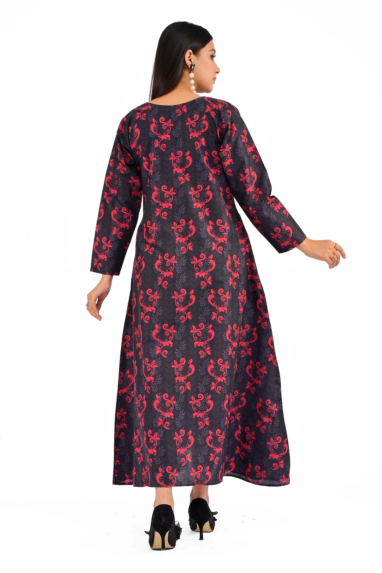 Back view of a black dress with red floral motifs, highlighting the long sleeves and smooth flowing design. BOLDSTEP BOLDSTEP.PK