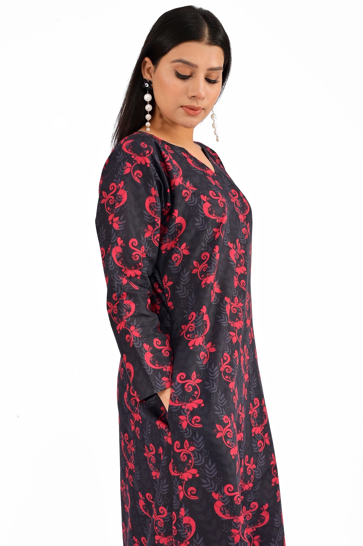 Close-up side view of a black dress with red floral details, emphasizing the V-neckline and long sleeves. BOLDSTEP BOLDSTEP.PK