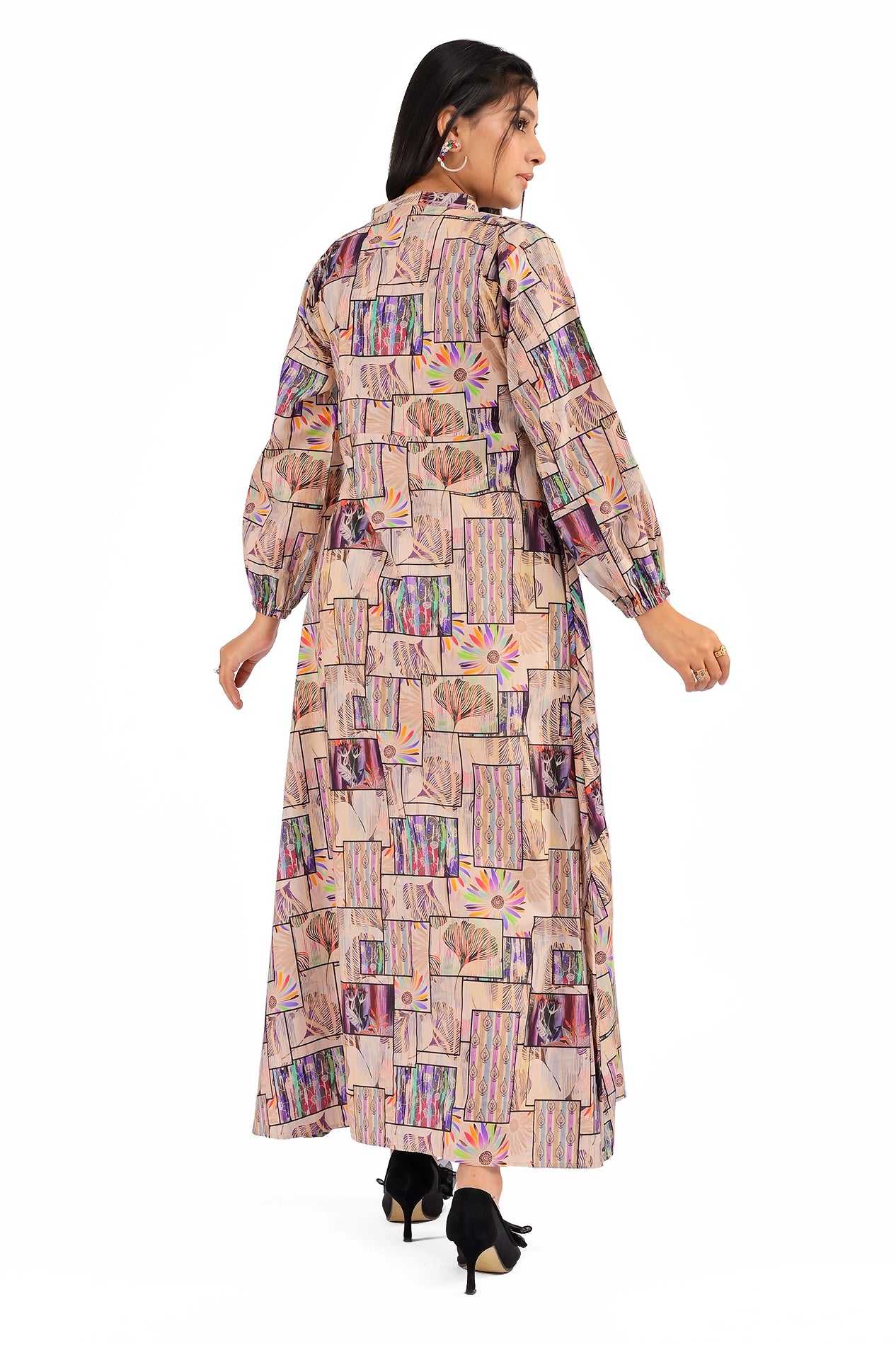 Back view of a multicolor geometric printed dress with an elegant flowy design, highlighting its intricate patterns and lightweight fabric. BOLDSTEP BOLDSTEP.PK