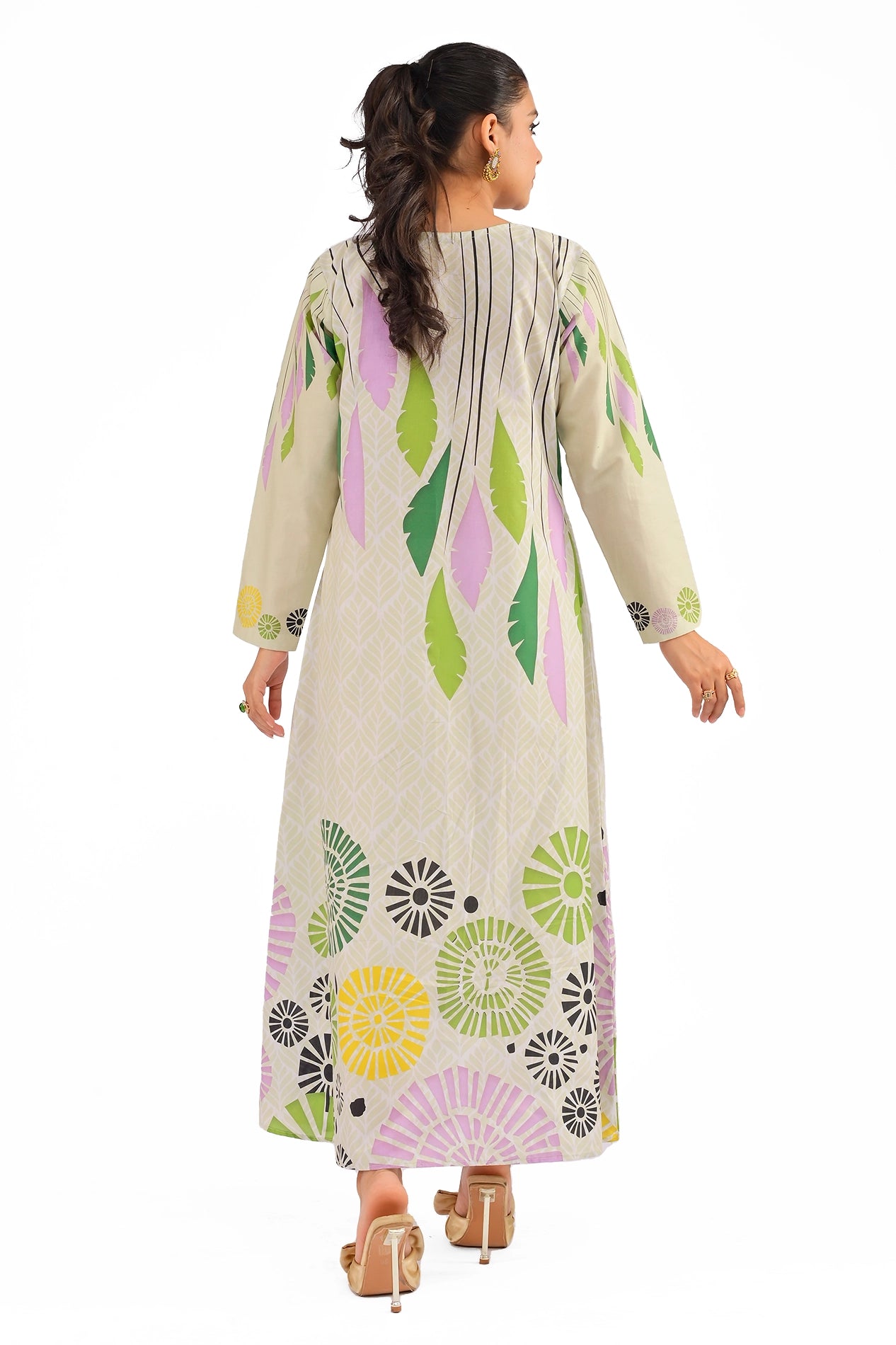 Back view of the dress featuring cascading leaf patterns and vibrant circular designs near the hemline. BOLDSTEP BOLDSTEP.PK