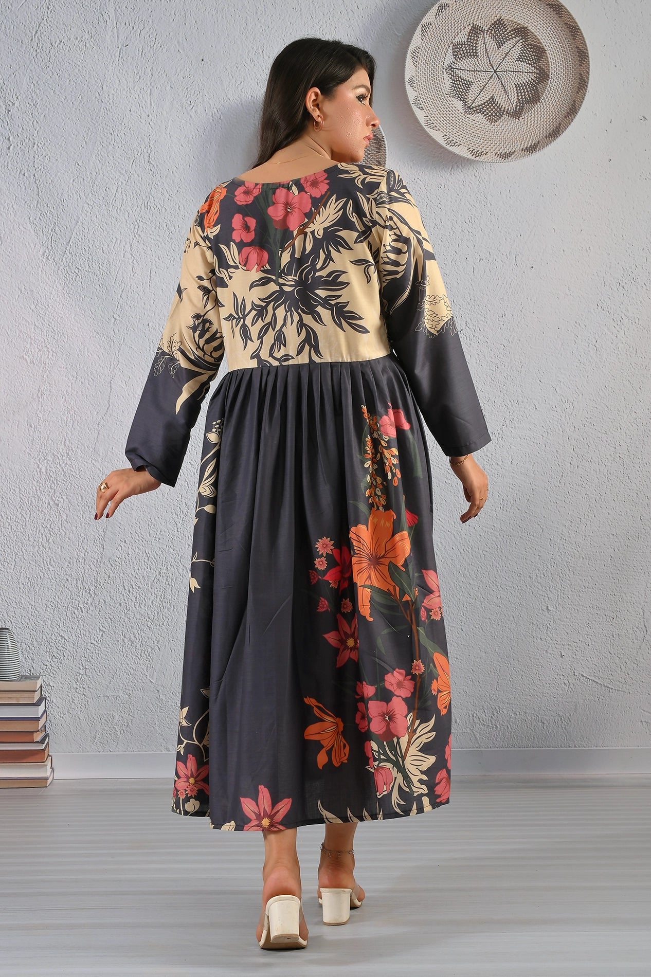 Back view of BOLDSTEP two-tone floral printed maxi dress in premium cotton, beige top with black base and multicolor floral patterns – BOLDSTEP.PK fashion | BOLDSTEP STORE