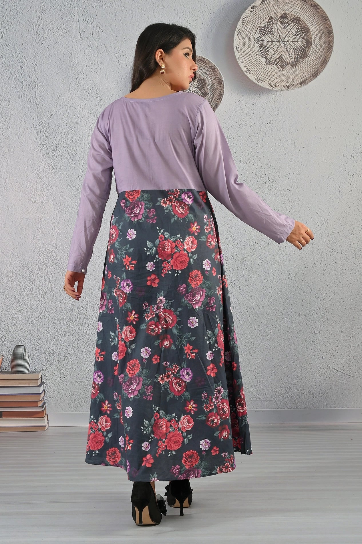 Back view of model wearing BOLDSTEP lavender and black floral printed cotton maxi dress with red and purple rose motifs – Elegant BOLD STEP design at BOLDSTEP.PK | BOLDSTEP STORE.