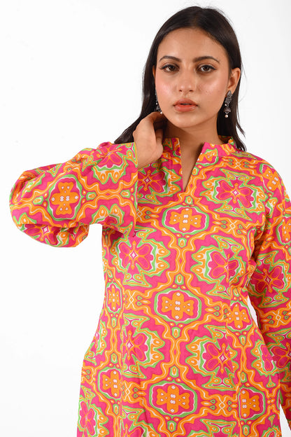 A close-up view of the kurta's neckline and upper pattern, emphasizing the vibrant geometric and floral designs, styled with pearl-drop earrings for an elegant touch BOLDSTEP BOLDSTEP.PK