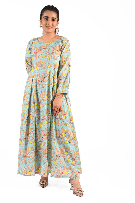 front view of the aqua blue maxi dress, emphasizing the delicate leaf pattern, button-down details, and the model's matching gold bracelet BOLDSTEP BLDSTEP.PK
