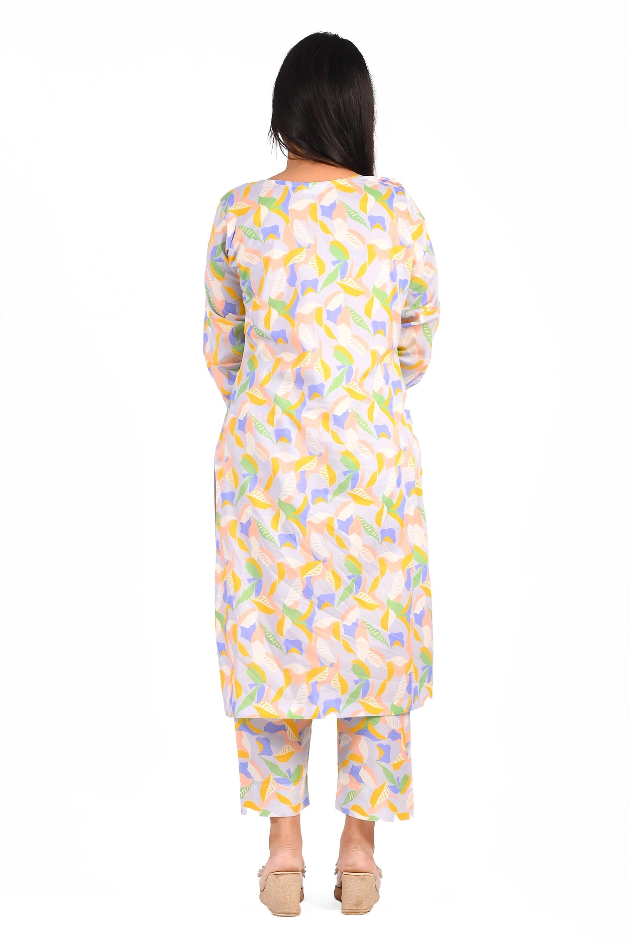 A back view of a pastel-colored floral leaf patterned dress. The matching trousers create a cohesive and elegant look. The outfit is ideal for casual outings, offering both style and comfort BOLDSTEP BOLDSTEP.PK
