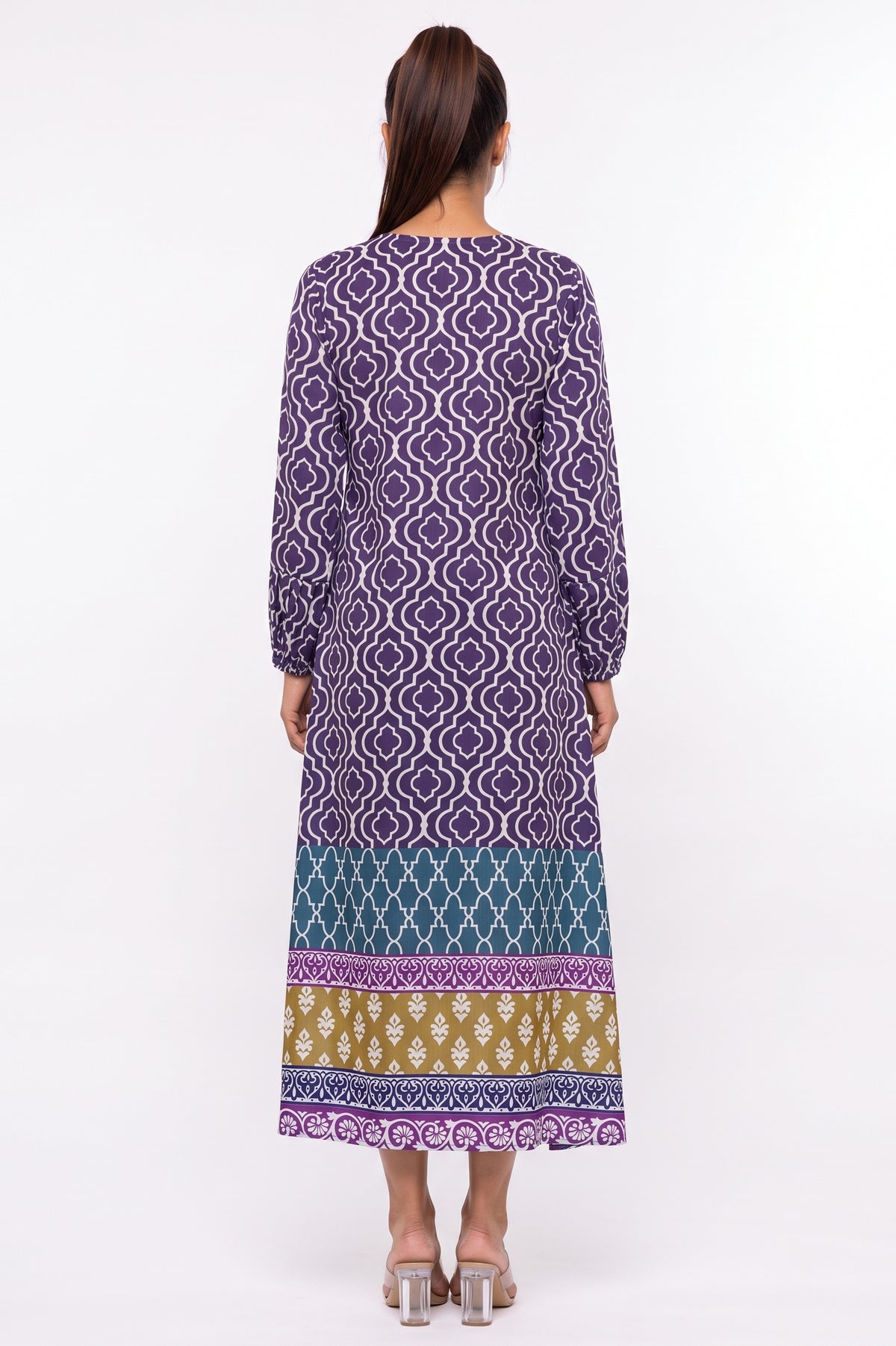Back full-length view of BOLDSTEP purple geometric trellis printed Swiss Bana Dora long dress.