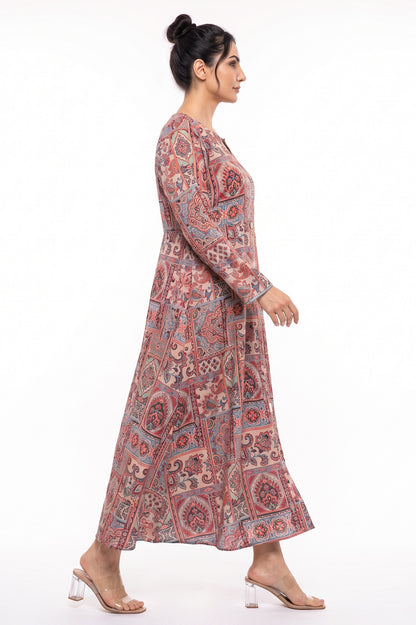 Side profile view of BOLDSTEP beige mosaic tile paisley printed winter maxi dress in motion.