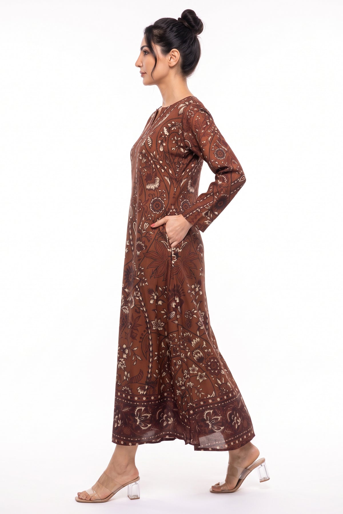 Side profile view of BOLDSTEP rust brown batik motif printed winter long dress showing side pocket.