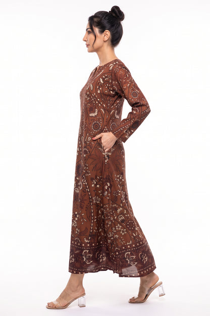 Side profile view of BOLDSTEP rust brown batik motif printed winter long dress showing side pocket.