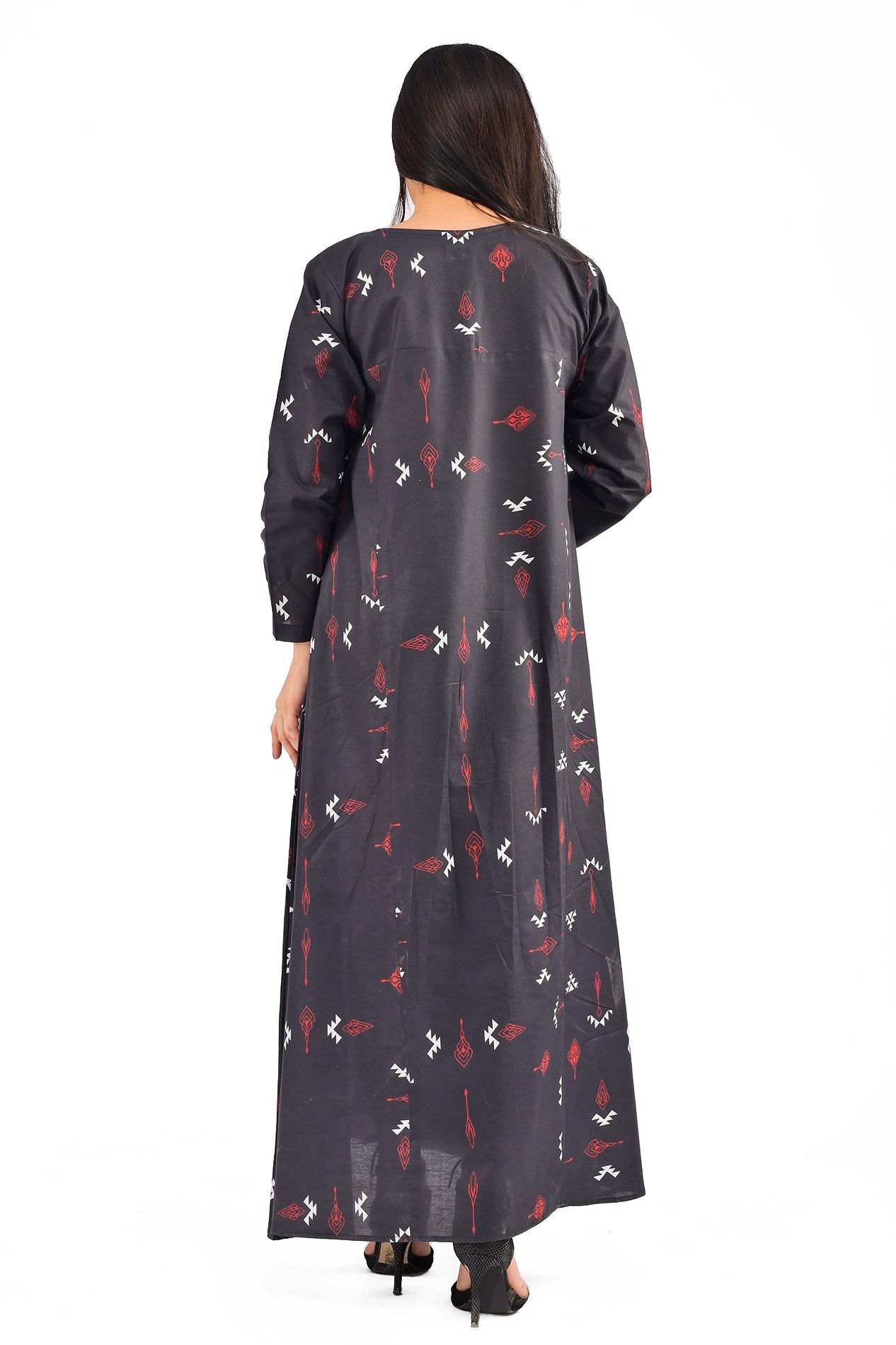 Back view of a black maxi dress with bold geometric prints in red and white, showing the dress's elegant fall and flow from the rear perspective.
BOLDSTEP BOLDSTEP.PK