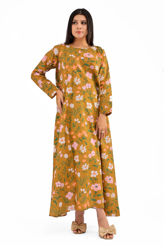 Model wearing a mustard long dress with pastel pink and white floral prints, standing confidently with her hand resting on her hip BoldSTEP BOLDSTEP.pk