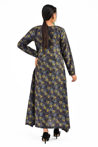 A back view of the black dress with yellow and green ginkgo leaf patterns, highlighting the flowing silhouette and the smooth fit of the fabric. BOLDSTEP BOLDSTEP.PK