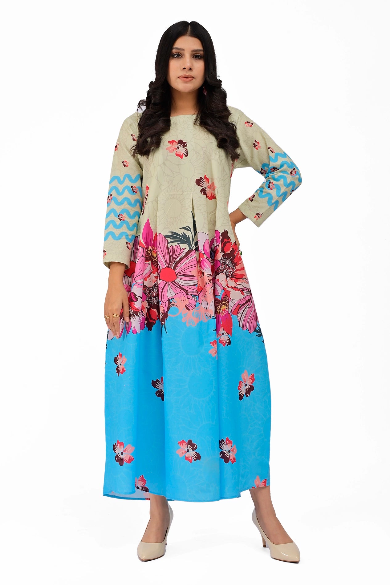 A stylish A-line dress with an off-white upper bodice and sky blue lower section, featuring vibrant pink and magenta floral prints and intricate floral outlines. Full-length sleeves with blue zigzag accents add a modern touch. BOLDSTEP BOLDSTEP.PK