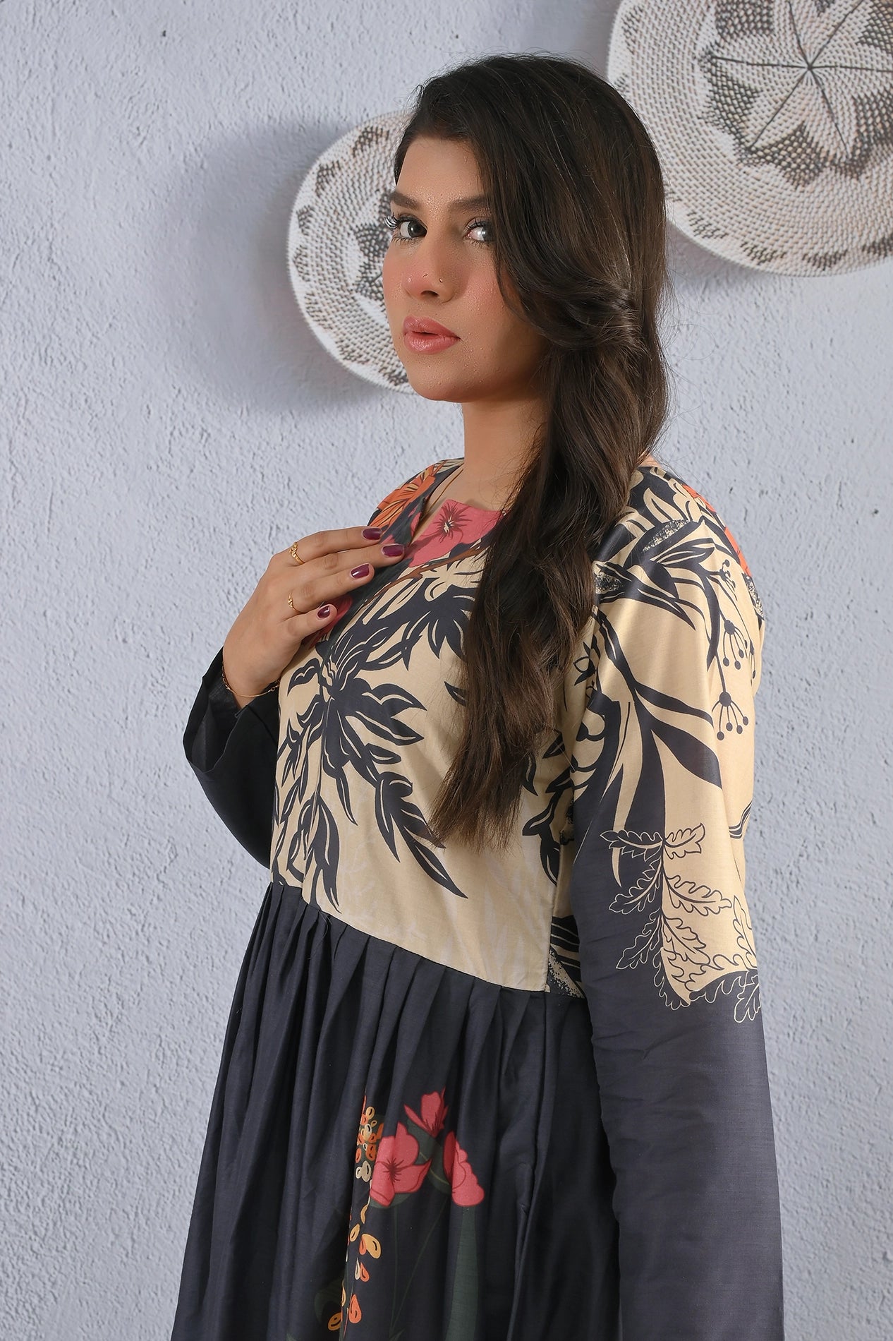 Elegant profile shot of model wearing BOLDSTEP cotton maxi dress in beige and black with vibrant floral prints – BOLD STEP original at BOLDSTEP STORE