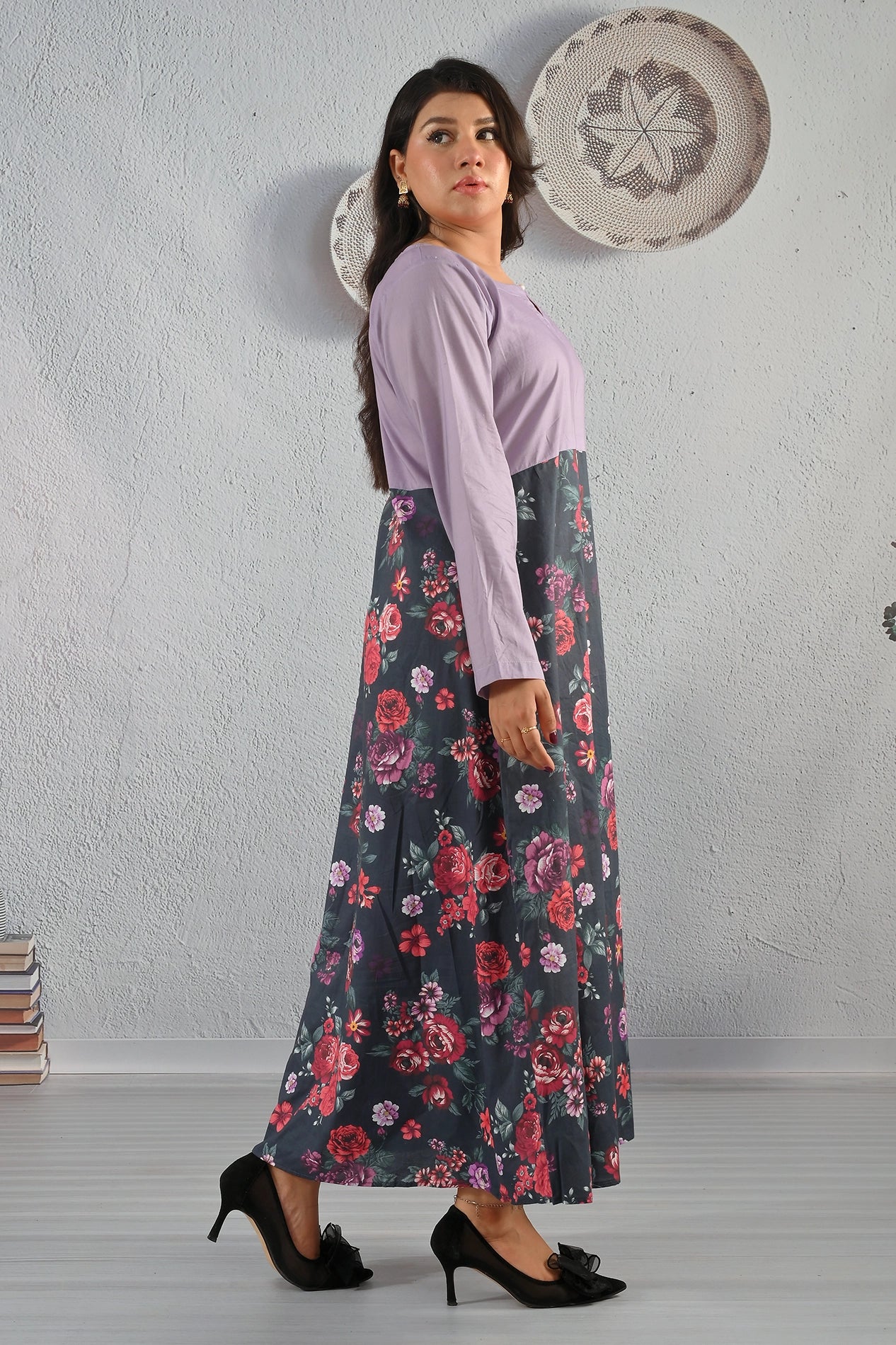 Side pose of BOLDSTEP lavender cotton maxi dress with dark floral print, full sleeves, and flowy silhouette – Available exclusively at BOLD STEP | BOLDSTEP.PK | BOLDSTEP STORE.