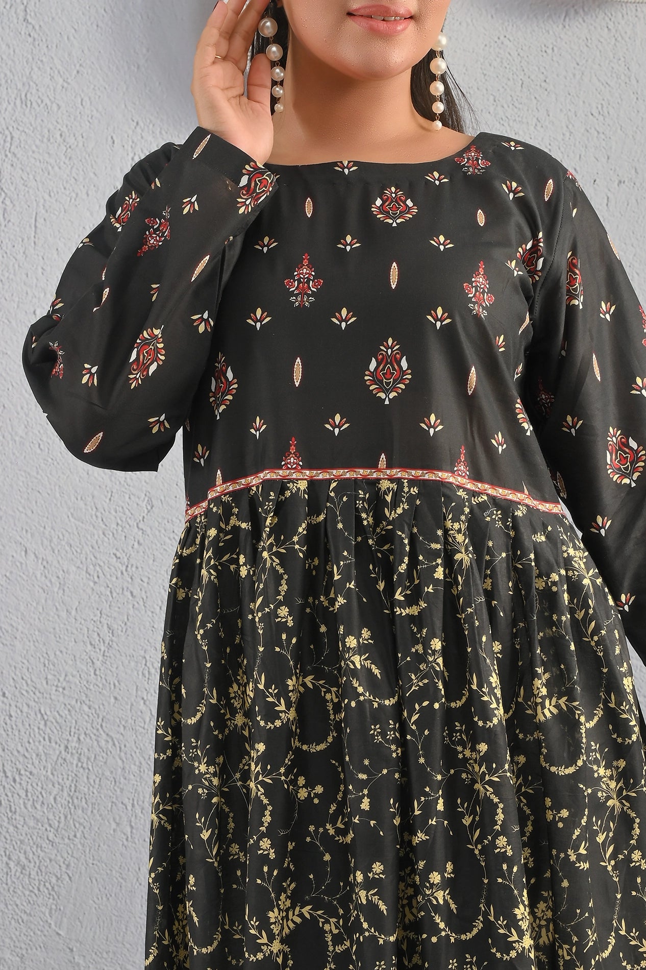 Close-up of BOLDSTEP black and gold printed cotton maxi dress showing neckline design and ethnic pattern – classy fashion from BOLD STEP | BOLDSTEP.PK | BOLDSTEP STORE.