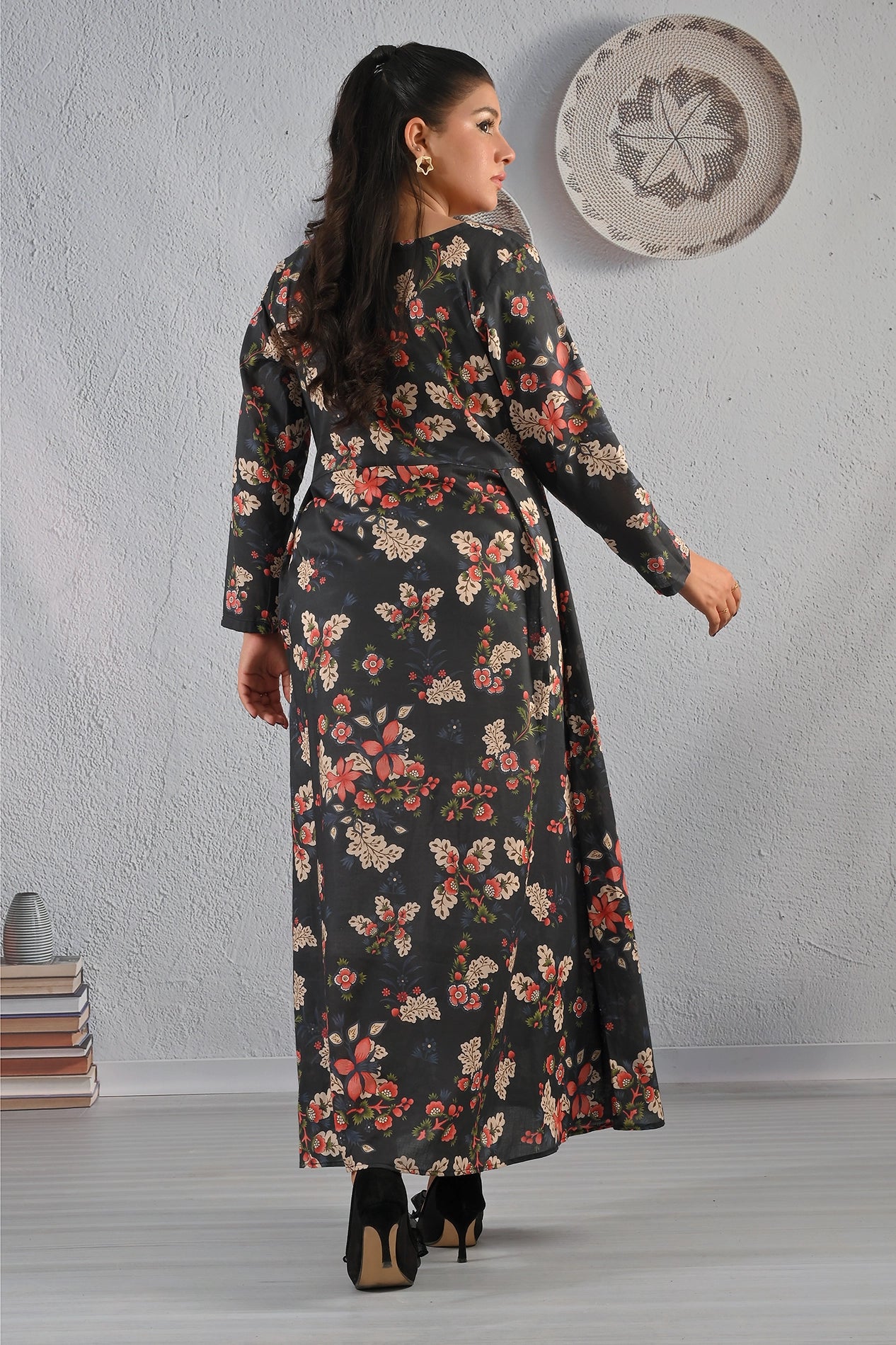 Back view of BOLDSTEP black floral printed maxi dress with all-over multicolor floral pattern and flowy silhouette – premium cotton outfit from BOLD STEP | BOLDSTEP.PK | BOLDSTEP STORE.