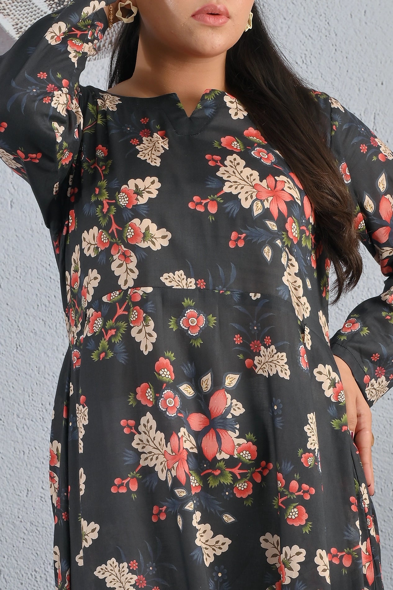 Close-up of BOLDSTEP floral printed cotton maxi dress showing detailed red and beige flower design and neckline stitching – chic fashion from BOLD STEP | BOLDSTEP.PK | BOLDSTEP STORE.