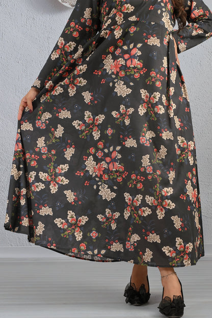 Fabric close-up of BOLDSTEP black cotton maxi dress with intricate red, beige, and green floral prints – soft breathable material by BOLD STEP | BOLDSTEP.PK | BOLDSTEP STORE.