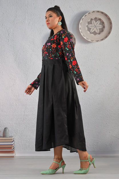 Side profile of BOLDSTEP floral printed black maxi dress featuring long sleeves, flared hem, and elegant flow – chic design from BOLD STEP | BOLDSTEP.PK | BOLDSTEP STORE.
