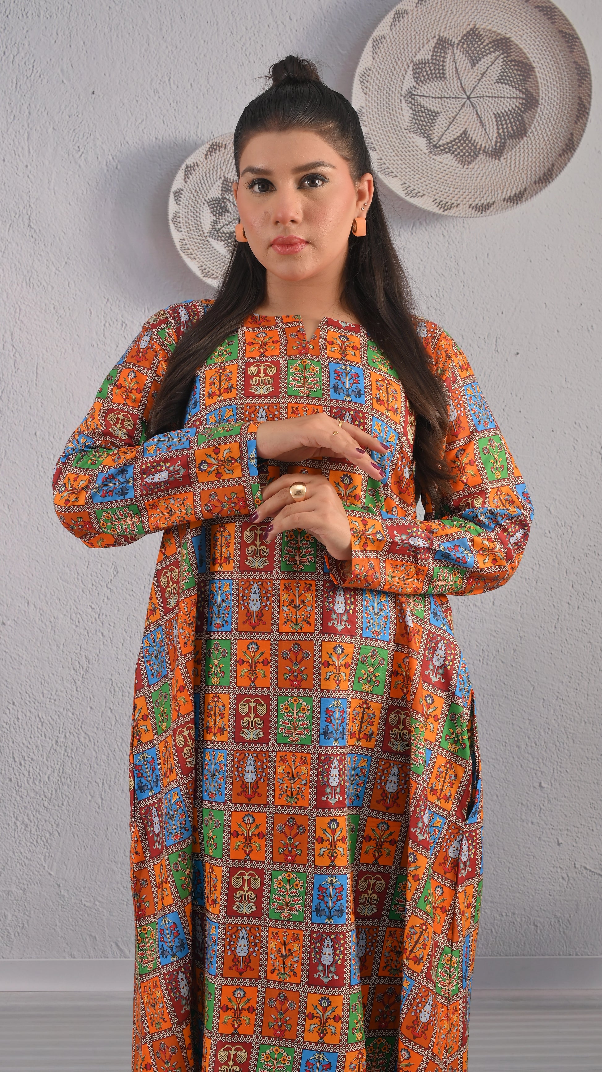 BOLDSTEP orange multicolor ethnic printed maxi dress with long sleeves and geometric block pattern – elegant front close-up look | BOLD STEP | BOLDSTEP.PK | BOLDSTEP STORE.