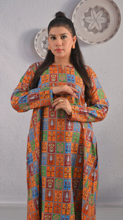 BOLDSTEP orange multicolor ethnic printed maxi dress with long sleeves and geometric block pattern – elegant front close-up look | BOLD STEP | BOLDSTEP.PK | BOLDSTEP STORE.