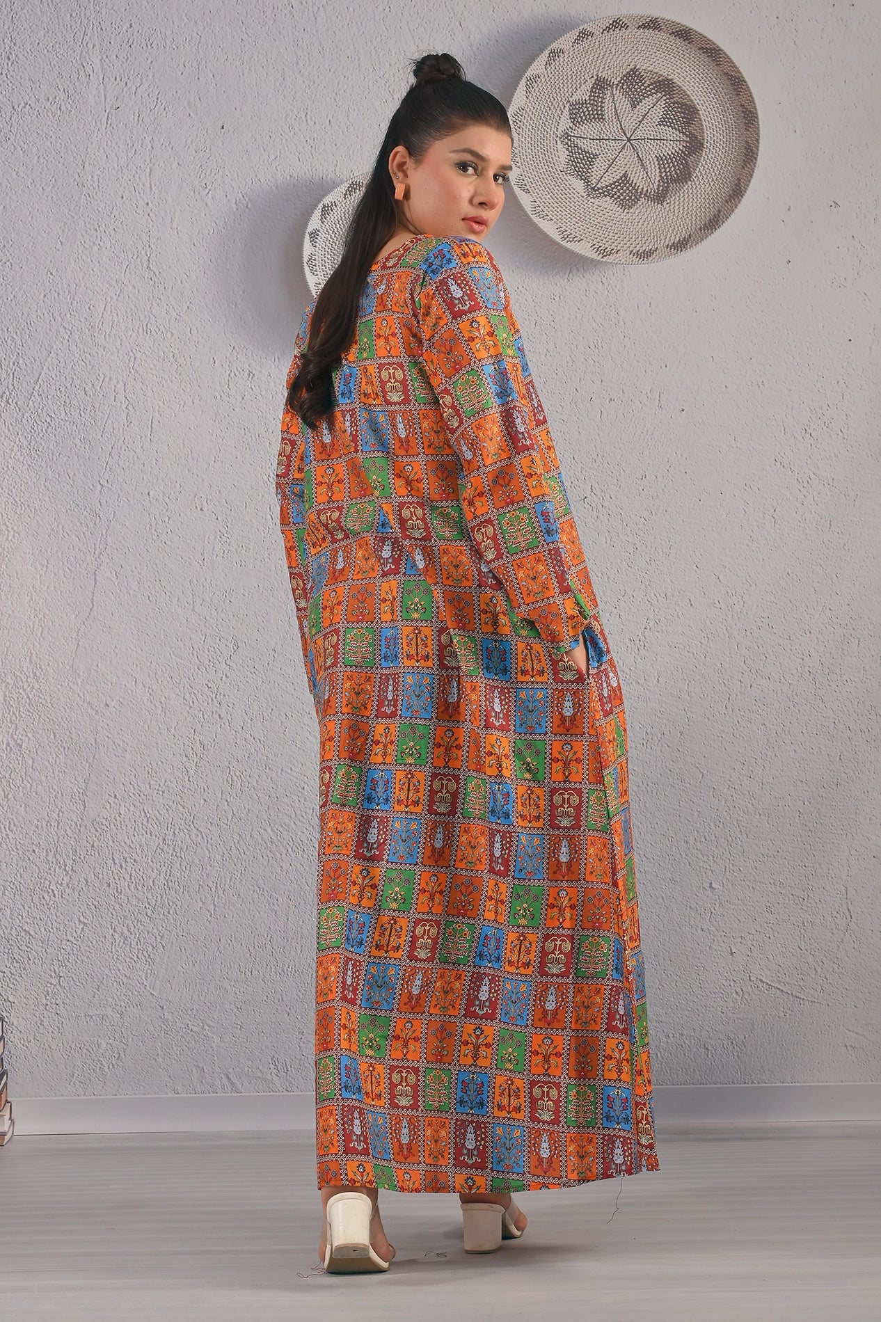 Back view of BOLDSTEP colorful ethnic printed maxi dress with bold square motifs and full-length coverage – stylish modest outfit | BOLD STEP | BOLDSTEP.PK | BOLDSTEP STORE.