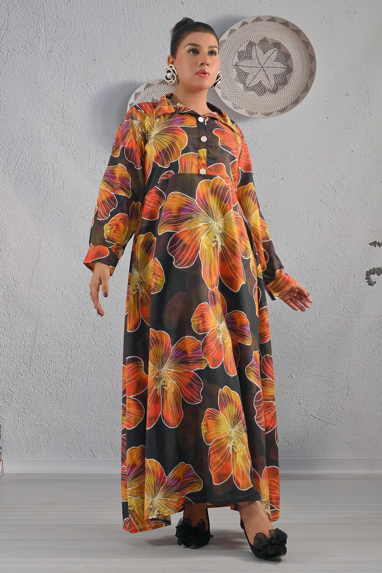 Front full-length view of BOLDSTEP floral printed black maxi dress with buttoned neckline and large orange flower motifs – premium cotton outfit | BOLD STEP | BOLDSTEP.PK | BOLDSTEP STORE.