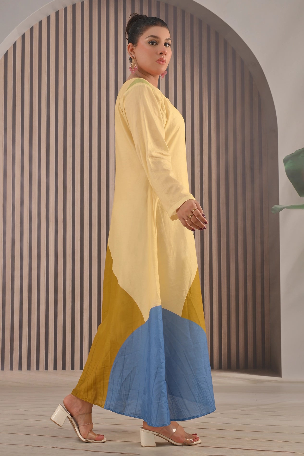 Side angle showing flowy silhouette of BOLDSTEP yellow and blue cotton maxi dress with minimal floral touch – chic and elegant design | BOLD STEP | BOLDSTEP.PK | BOLDSTEP STORE.