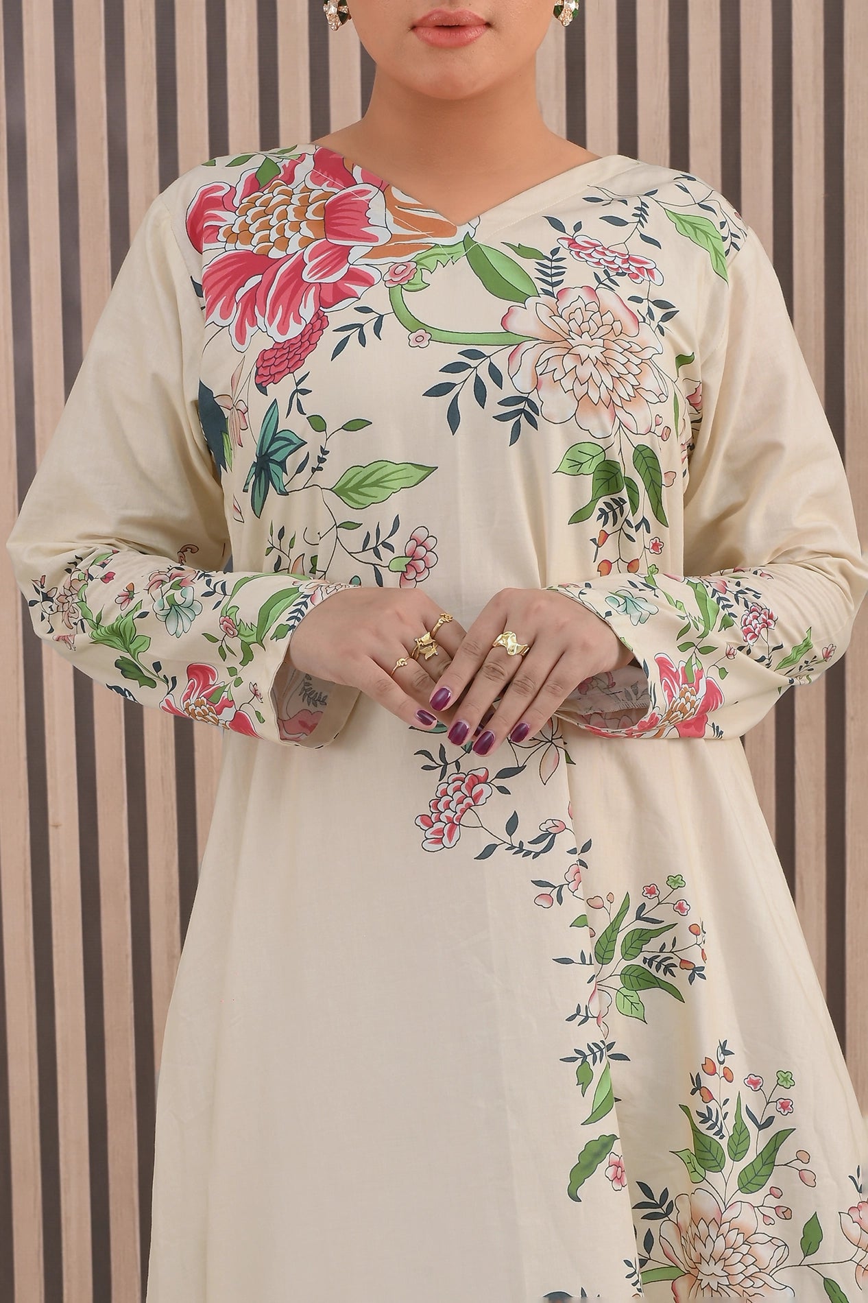 Close-up of BOLDSTEP cream maxi dress neckline and sleeves with multicolor floral print detailing – sophisticated stitched cotton outfit | BOLD STEP | BOLDSTEP.PK | BOLDSTEP STORE.