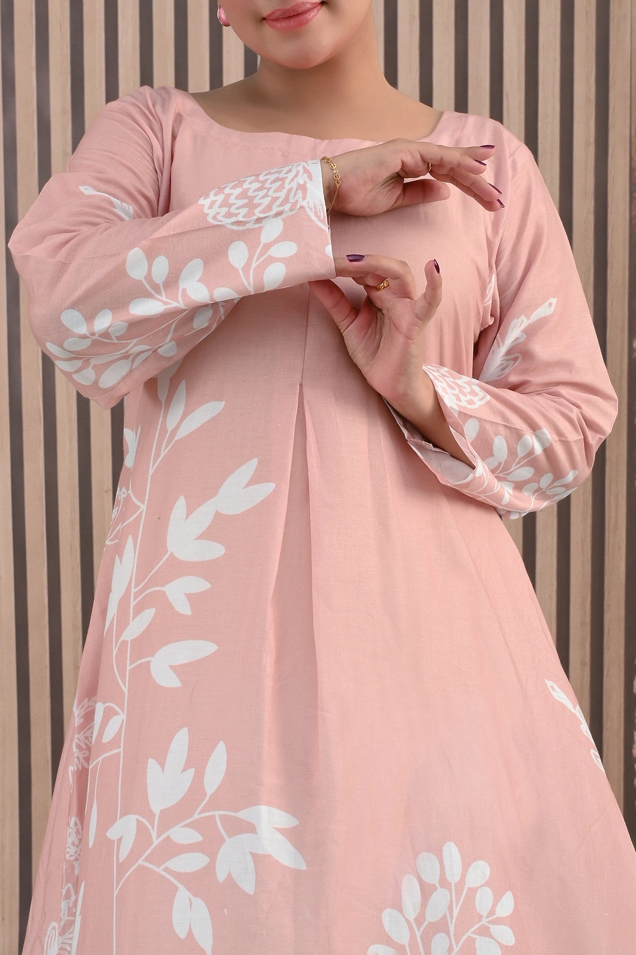 Close-up of BOLDSTEP pink maxi dress fabric and sleeve pattern with white floral design — soft cotton stitched attire | BOLD STEP | BOLDSTEP.PK | BOLDSTEP STORE.