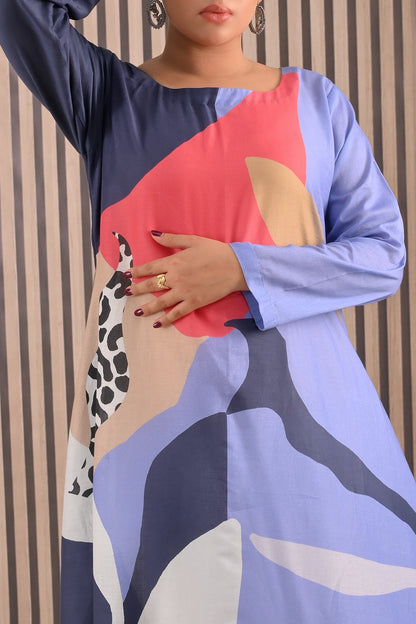 Close-up view of BOLDSTEP abstract printed maxi dress showing bold color blocks in navy, coral red, beige, and leopard print patterns on soft cotton fabric | BOLD STEP | BOLDSTEP.PK | BOLDSTEP STORE.