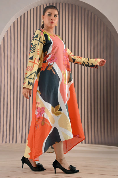Side angle view of BOLDSTEP floral abstract maxi dress highlighting vibrant coral orange and mustard hues with full-length printed sleeves and flowy hemline | BOLD STEP | BOLDSTEP.PK | BOLDSTEP STORE.