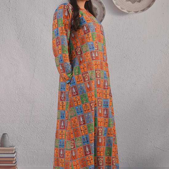 BOLDSTEP product video showcasing a multicolor ethnic printed maxi dress with orange, blue, green, and maroon square motifs. The model walks and poses to display the flowy silhouette, traditional block print design, and full-length sleeves – premium cultural fashion by BOLD STEP | BOLDSTEP.PK | BOLDSTEP STORE.
