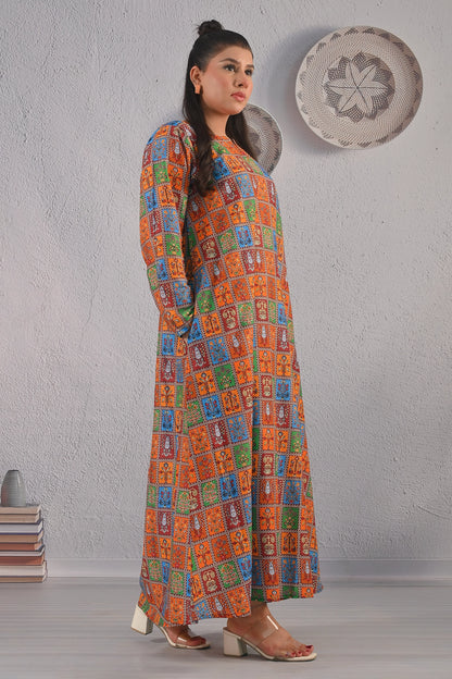 BOLDSTEP product video showcasing a multicolor ethnic printed maxi dress with orange, blue, green, and maroon square motifs. The model walks and poses to display the flowy silhouette, traditional block print design, and full-length sleeves – premium cultural fashion by BOLD STEP | BOLDSTEP.PK | BOLDSTEP STORE.