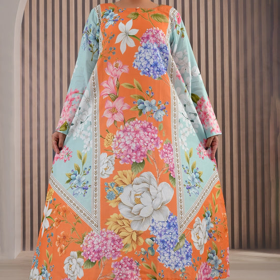 BOLDSTEP product video showcasing a vibrant orange and turquoise floral printed maxi dress. The model elegantly walks and poses to highlight the colorful floral design, long sleeves, and flowy A-line silhouette — a premium stitched outfit for women by BOLD STEP | BOLDSTEP.PK | BOLDSTEP STORE.